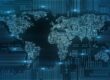 image showing "blockchain" written out with a hand pointing to a cybersecurity button|image of a manufacturing facility|digital map of the world